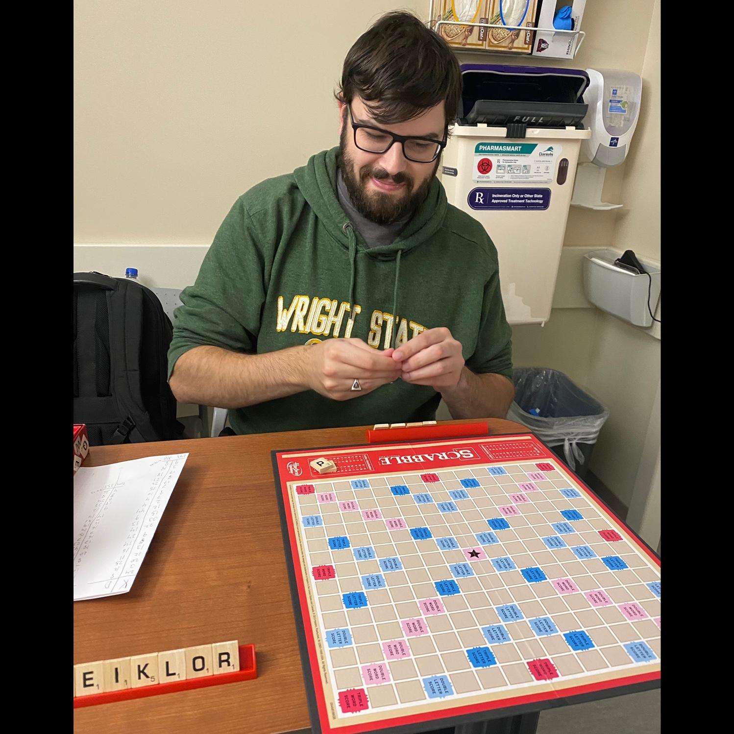 Dalton keeping Krista company in the hospital before surgery, May 2023