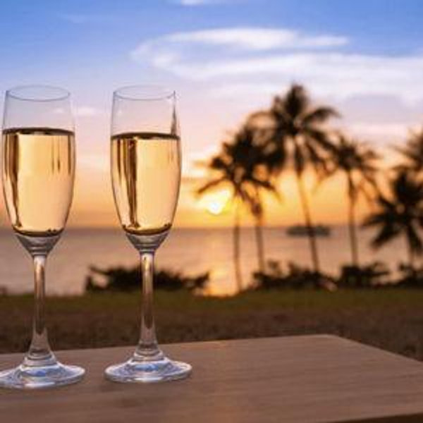 Champagne toast on our honeymoon! 🥂