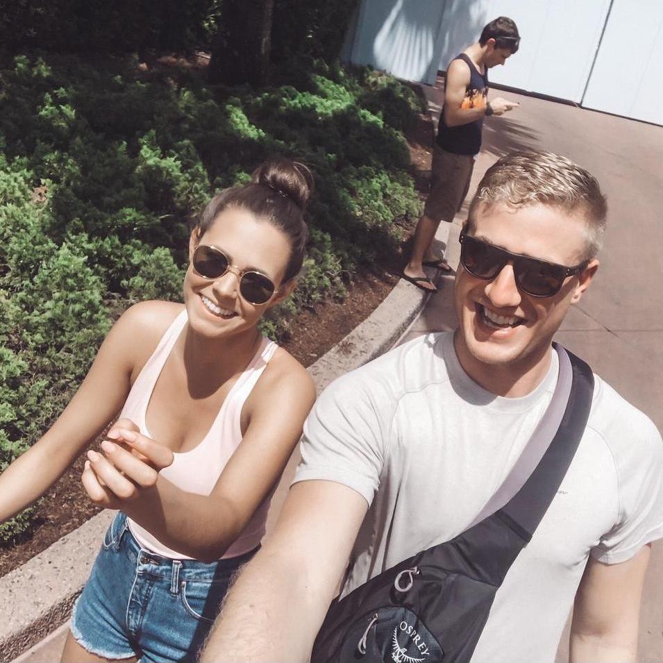 Chris found a selfie-stick and embarrassed Sarah at Epcot