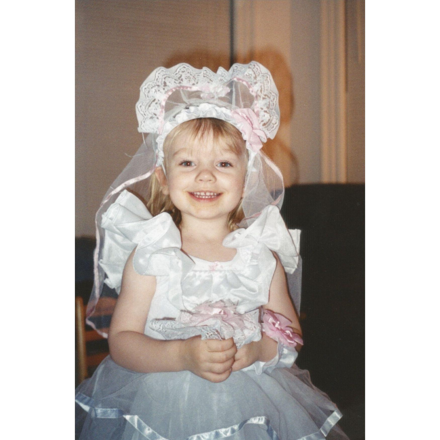 Baby bride. Note the distinct spaghetti-o stained mouth.