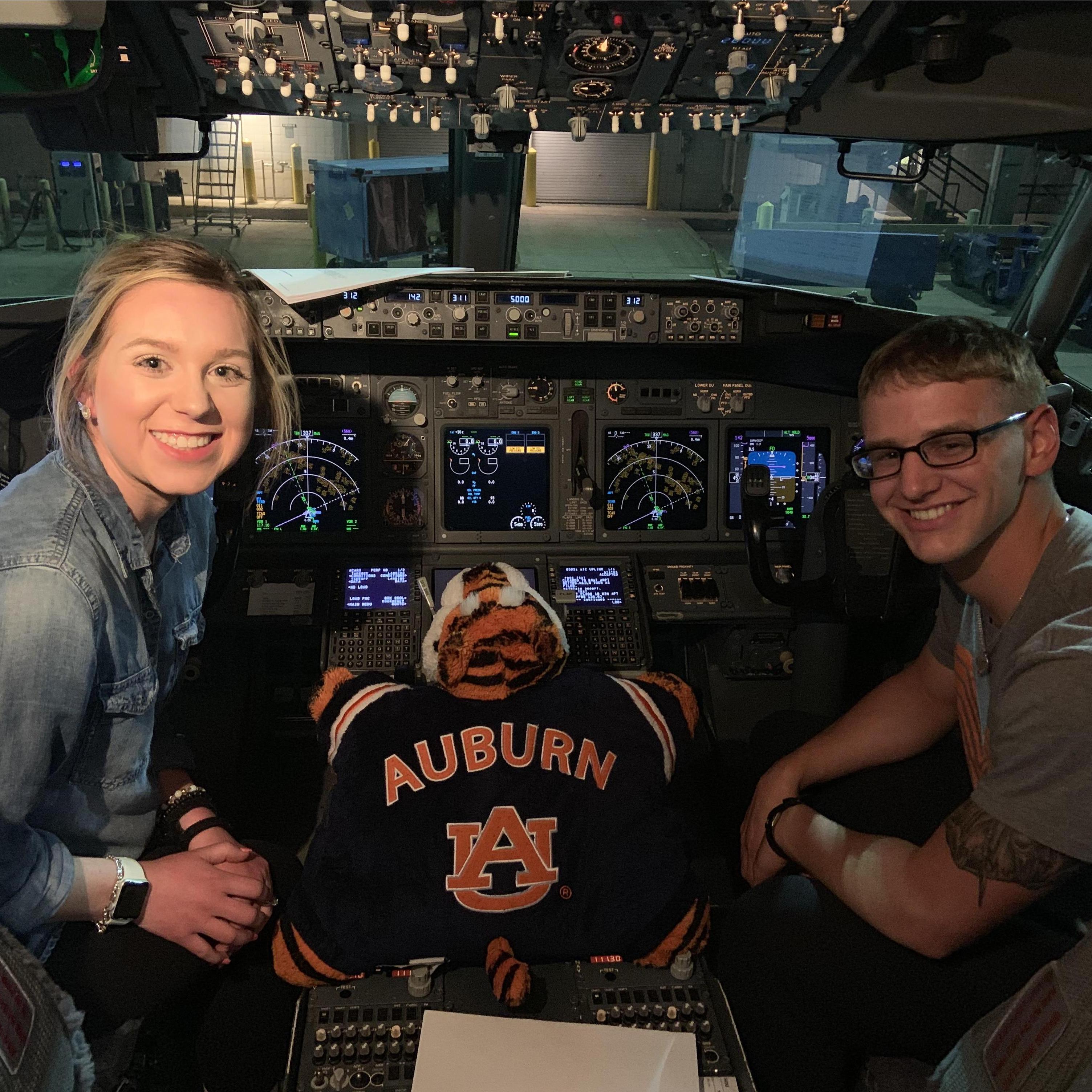 On a flight home, our pilot saw Madison's Aubie pillow and invited us into the cockpit (his daughter is an Auburn Alum). War Eagle!