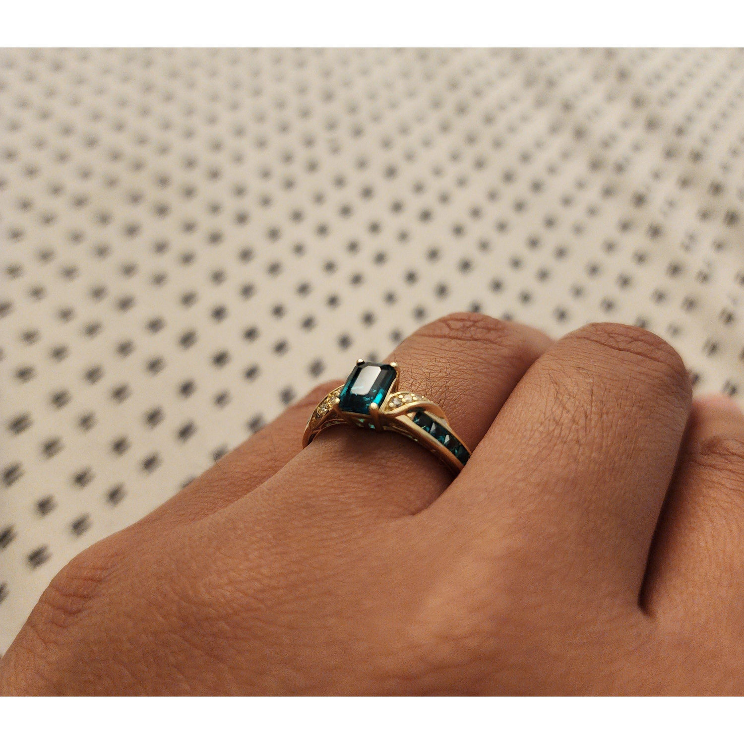 We found THE ring in Rogers, AR, on our last vacation as a long-distance couple. The ring signifies a commitment we dreamed of long ago... and Jewelle's love of the color green.