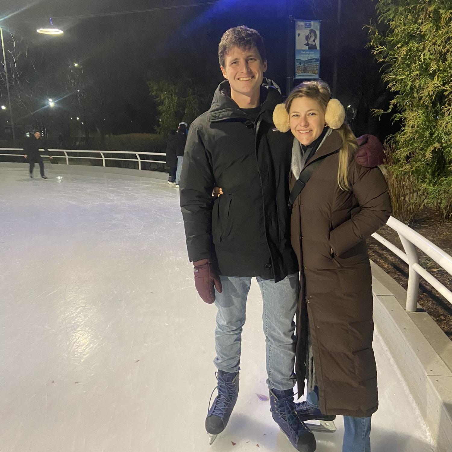 Burk showing Emily how to ice skate in Chicago in 2023!