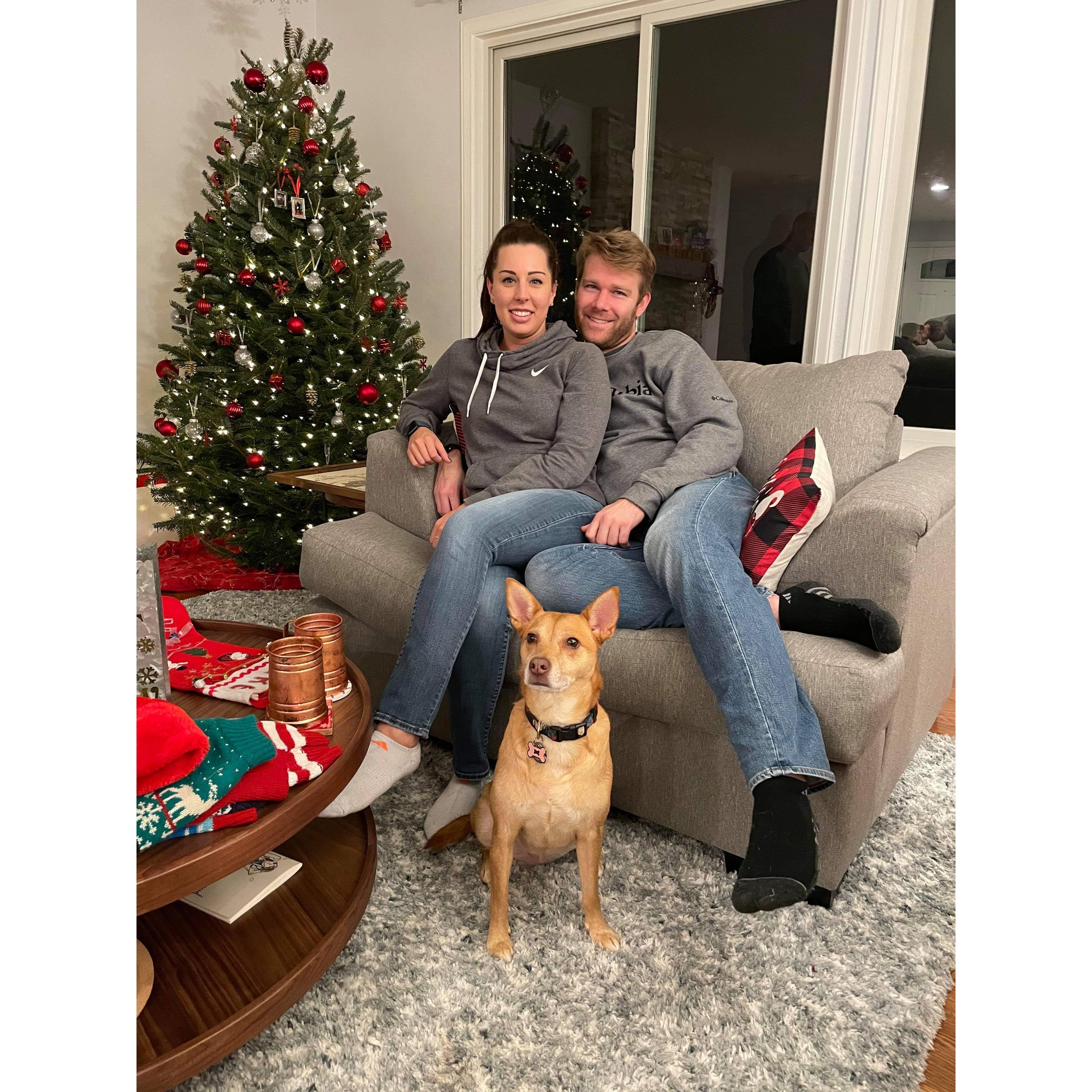 First Christmas together, with one of our dogs  Charlie.