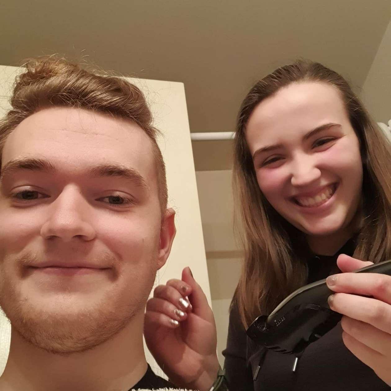 Anna cutting Ben's hair 2021