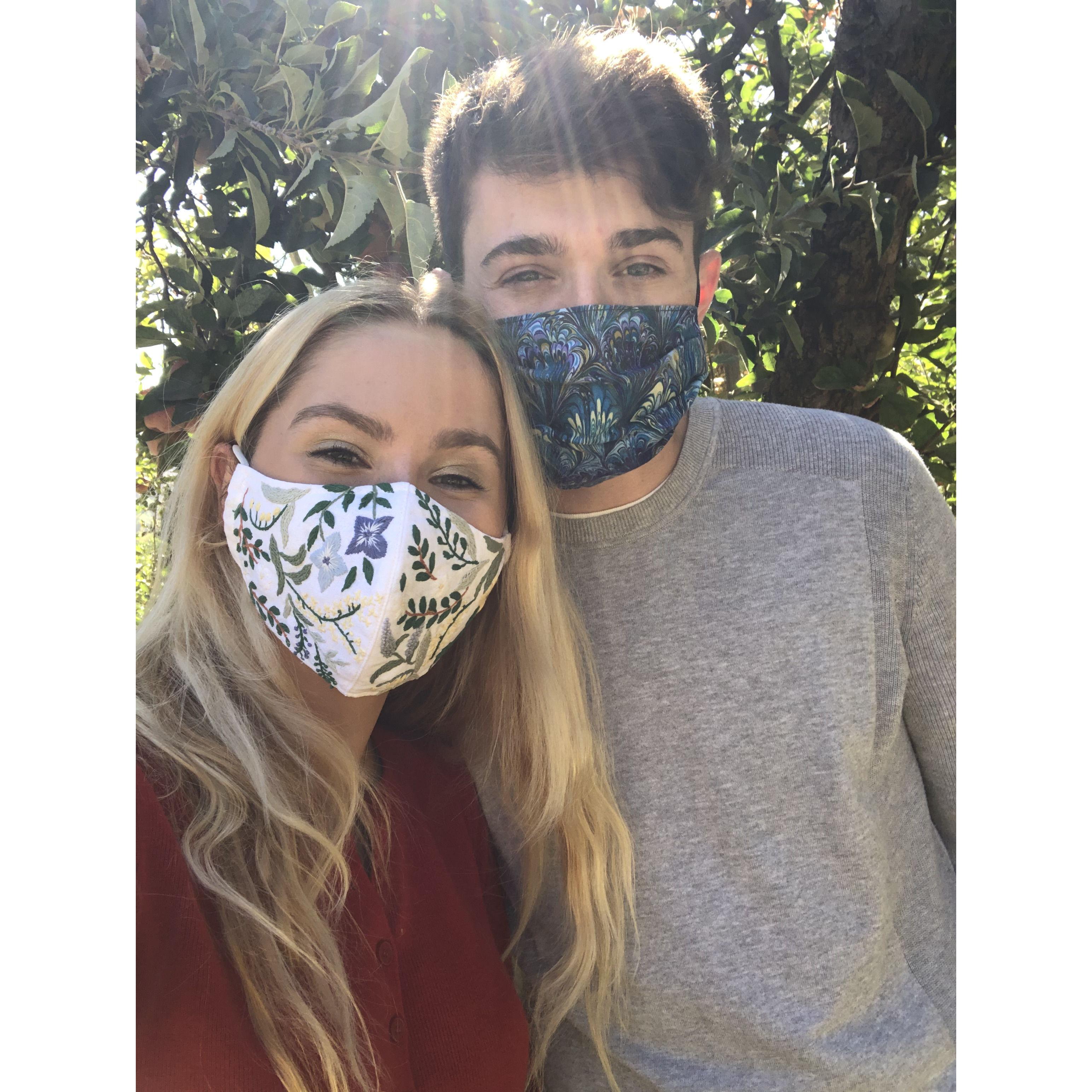 Jake and Morgan apple picking in Fall 2020.