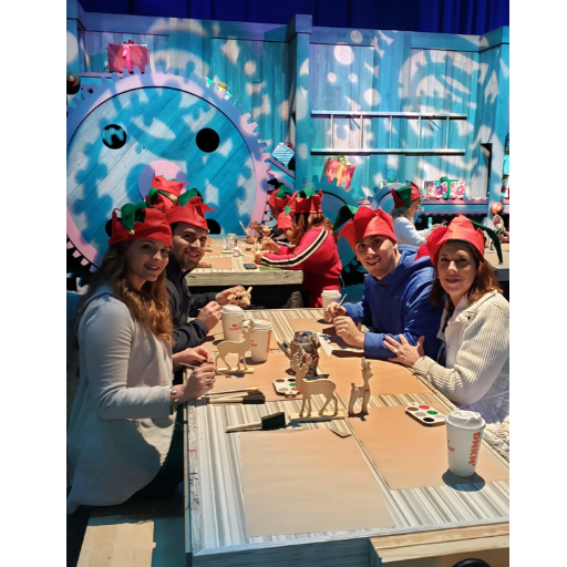 In Santa's workshop painting at the Gaylord Palms ICE event where Adam proposed.