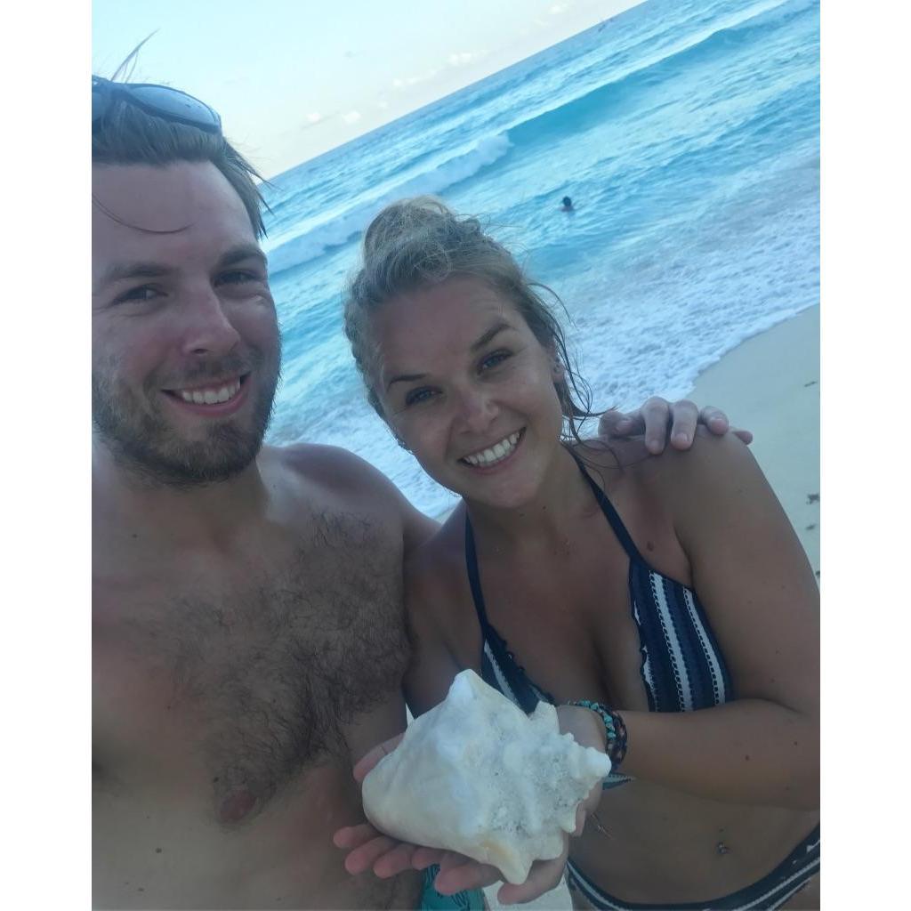 Vacation in Cancun, Mexico.
On a walk on the beach, Melissa spotted this shell rolling in the waves & Kevin jumped in to get it!
Cancun, 2017.