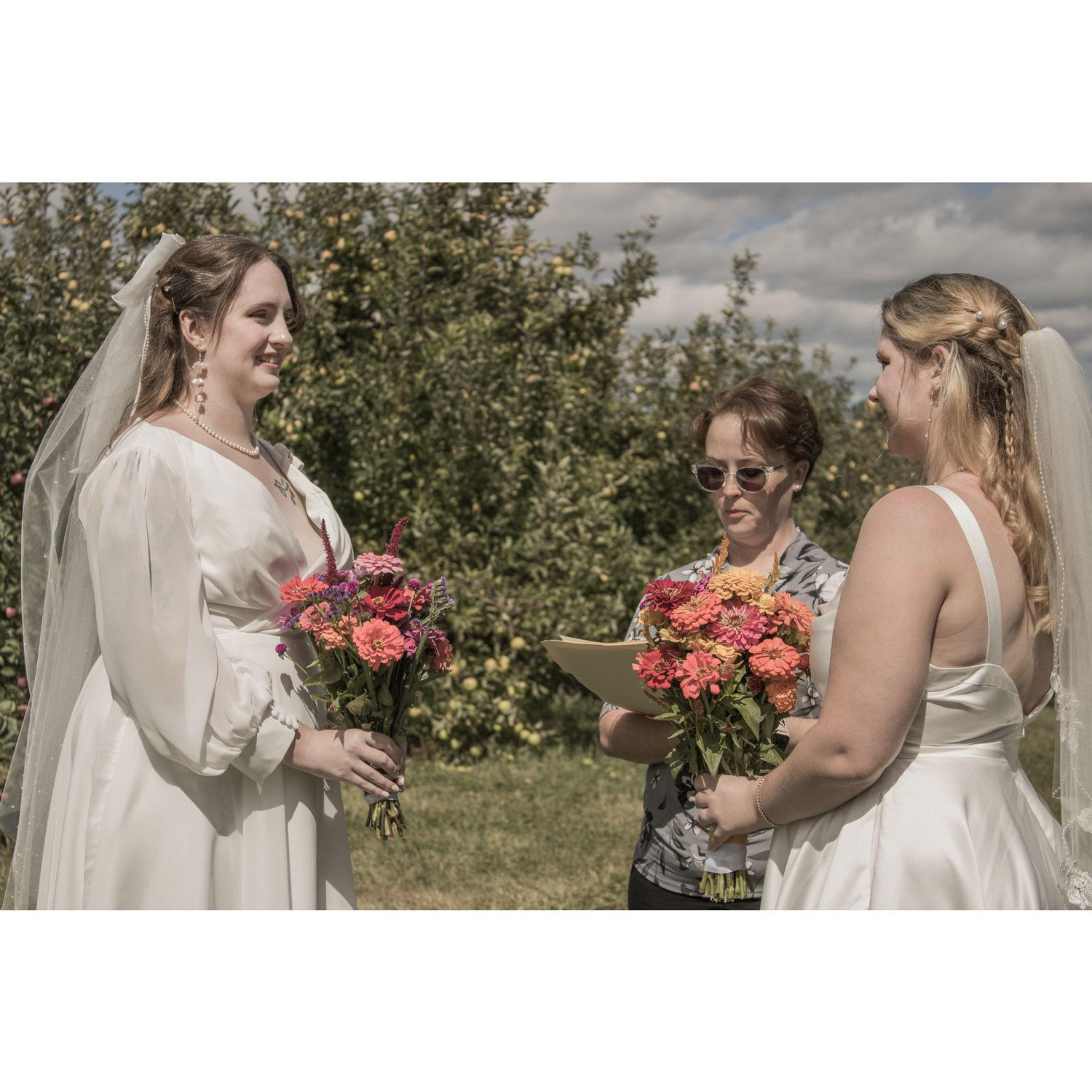 Aunt Shannon officiating Lillian and Tabitha's micro wedding