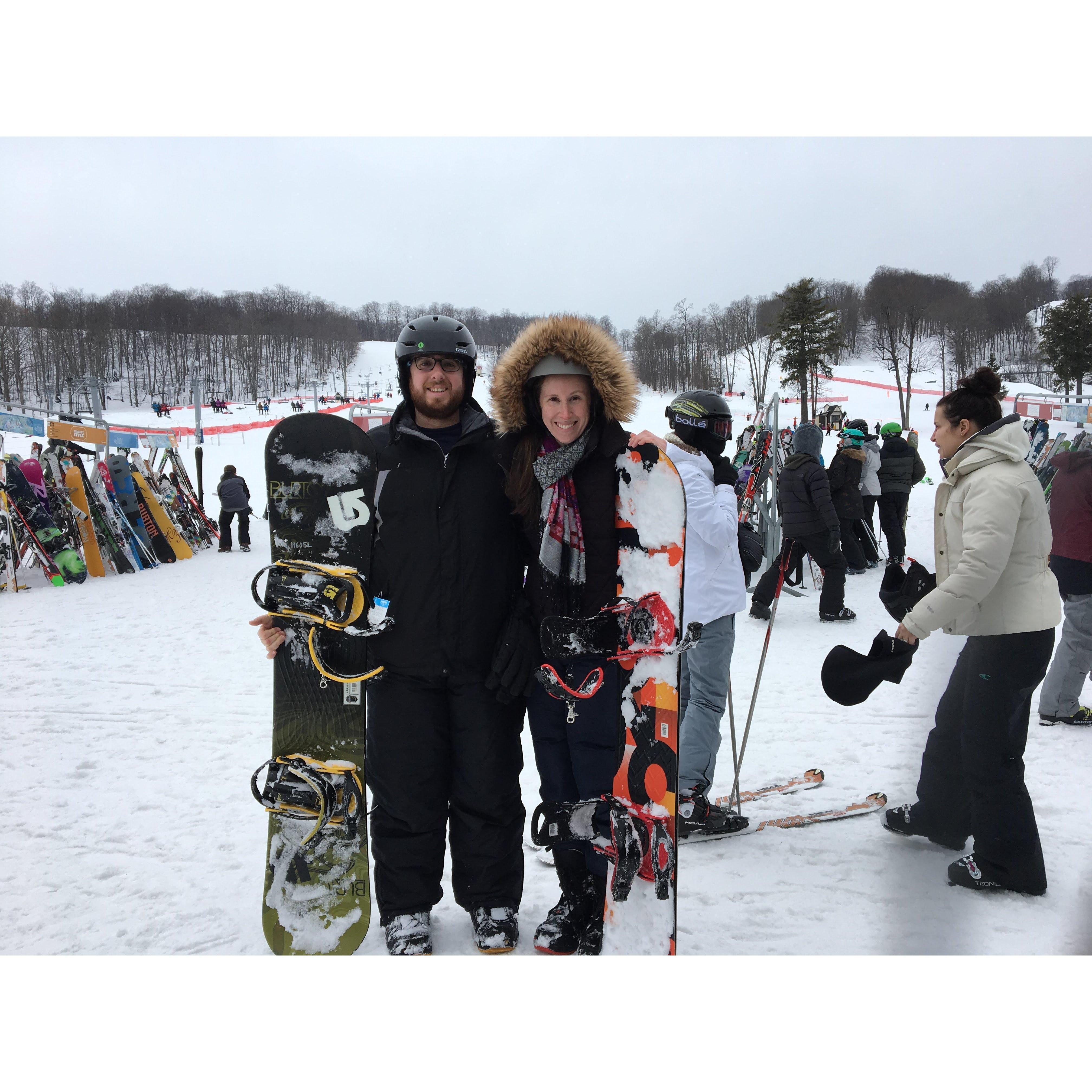 Snowboarding in Michigan! All smiles, even after wiping out.