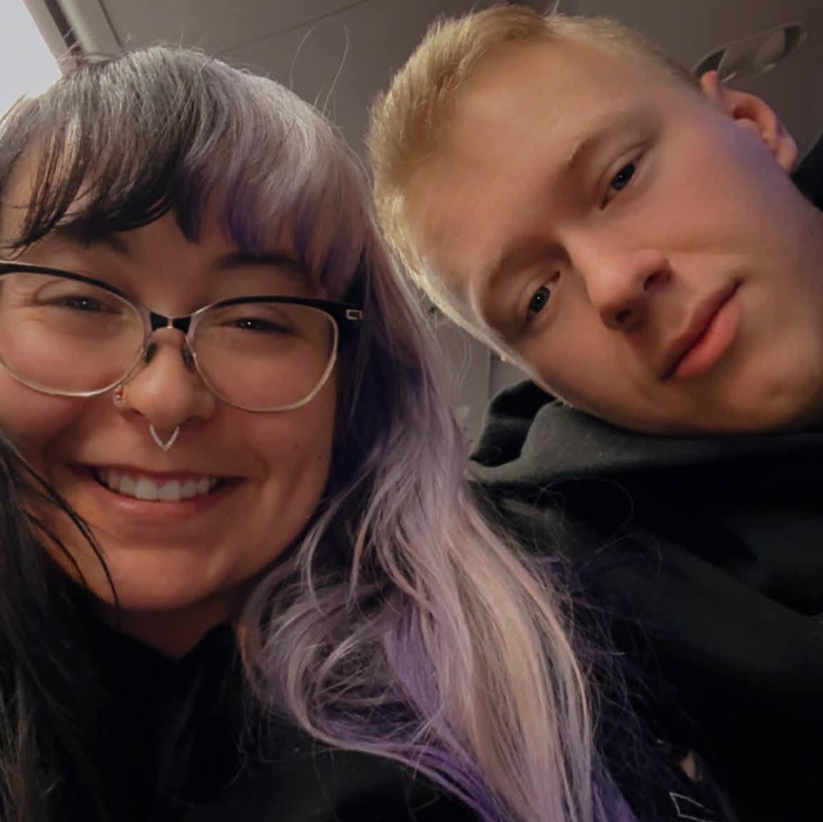 On the airplane before takeoff to Michigan