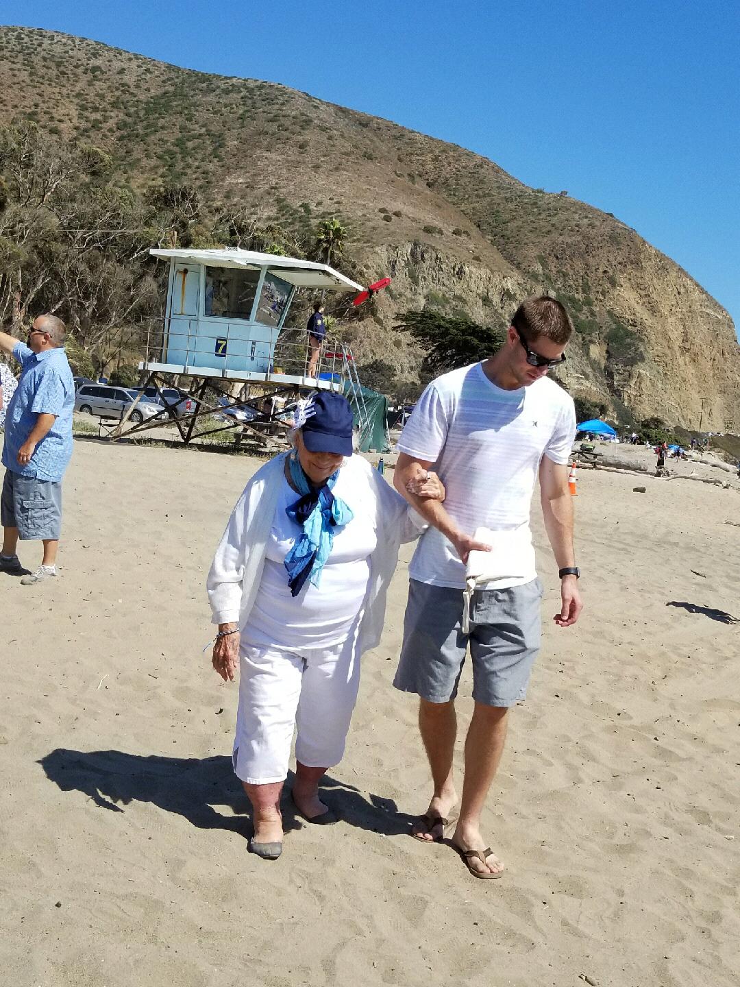 Denver and his grandma, Jo, walking to Nicole’s baptism