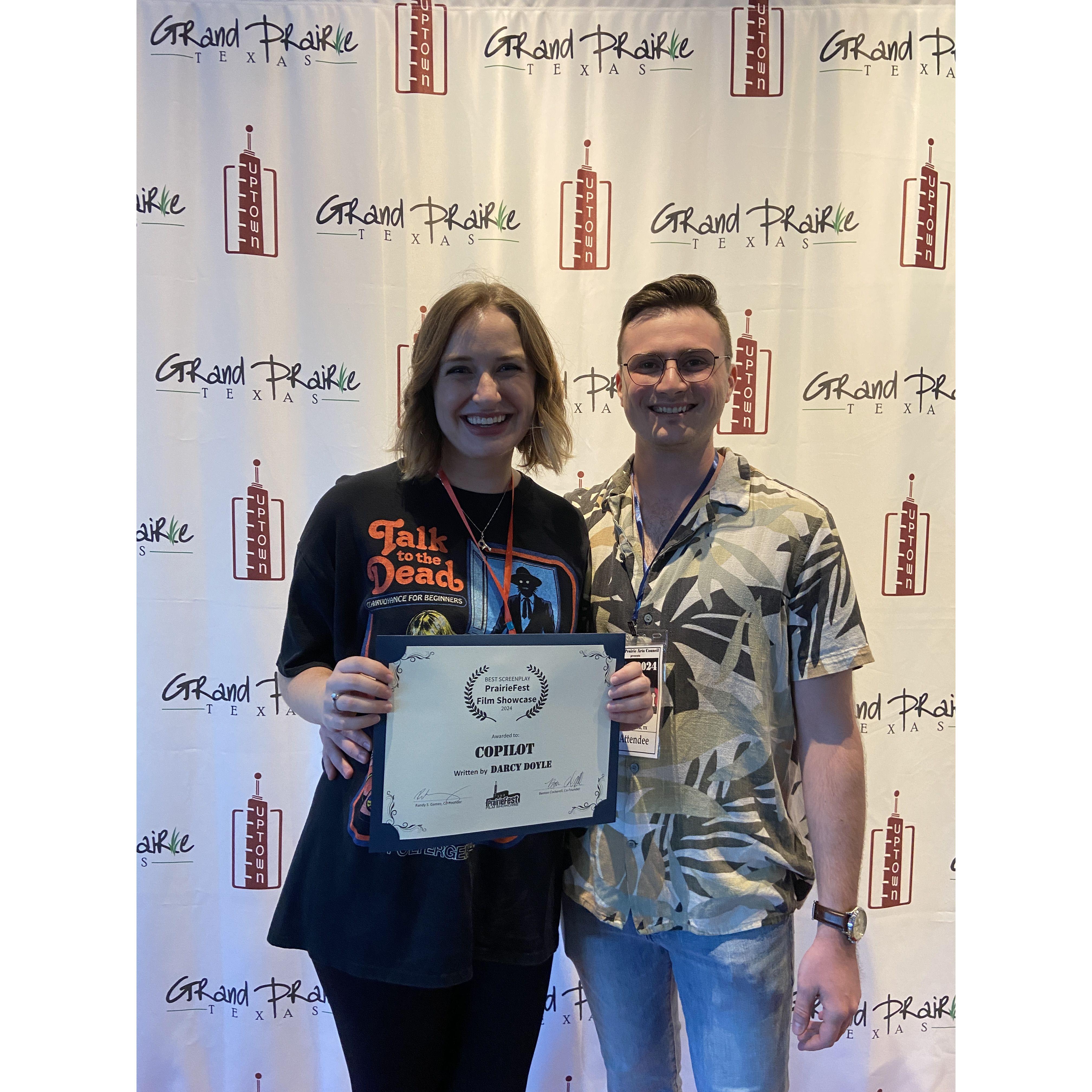 Darcy accepting her Best Screenplay award for "Copilot" at Prairie Fest. 9/1/24