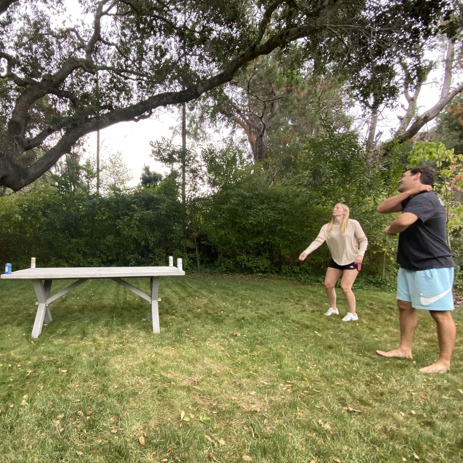 Abi putting the time in to mesh with Ryan's friends (Ryan able to take a photo because Abi beat him the game before)