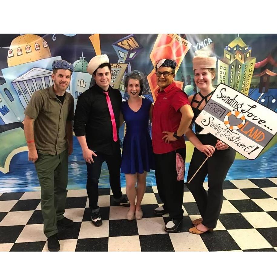This our first official photo together. It was early into dating and we went to the Heartland Swing Festival with friends.