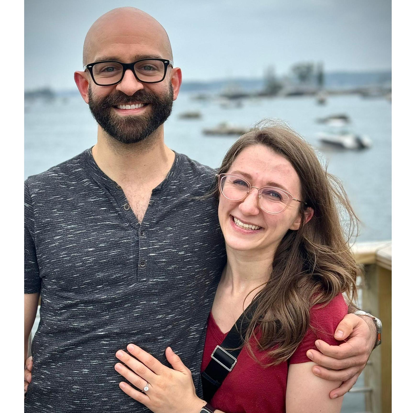 Moments after Justin popped the question and Abbie panicked while attempting to say "yes!" when a very nice couple offered to take a photo!
