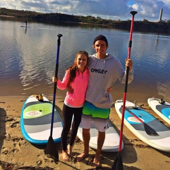 This was taken a long time ago when I could convince Sam to do paddle board yoga with me...