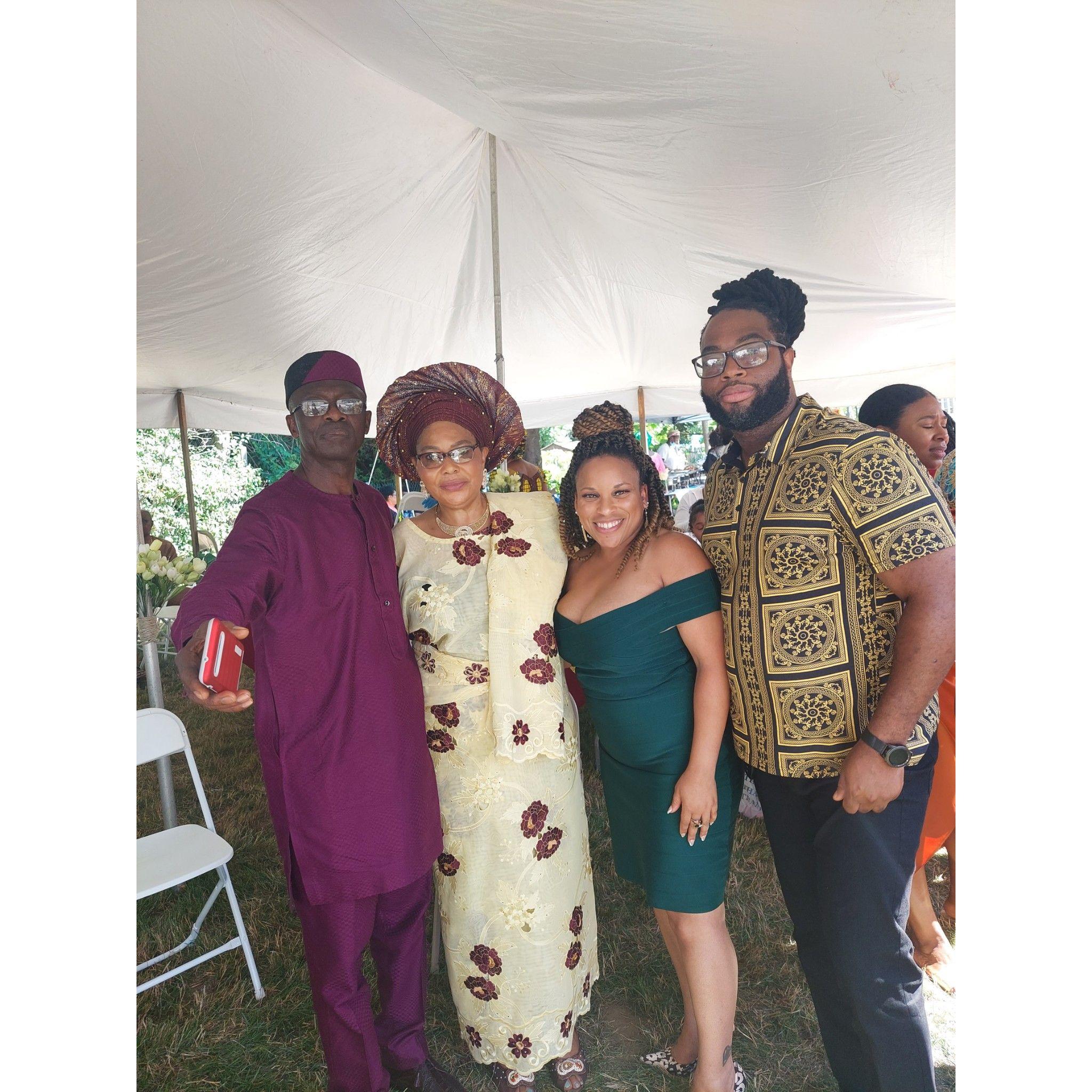 Meeting Charles's Mom for the 1st time. This was taken at the traditional ceremony for his cousin's wedding.