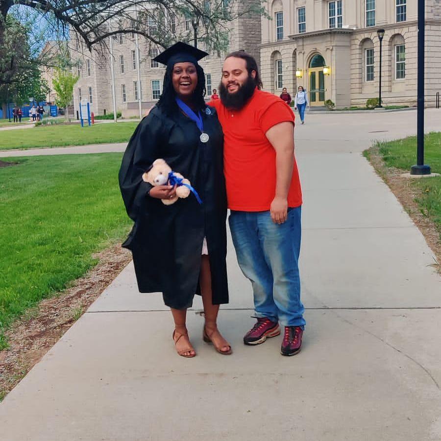Her graduation, his proud boyfriend era