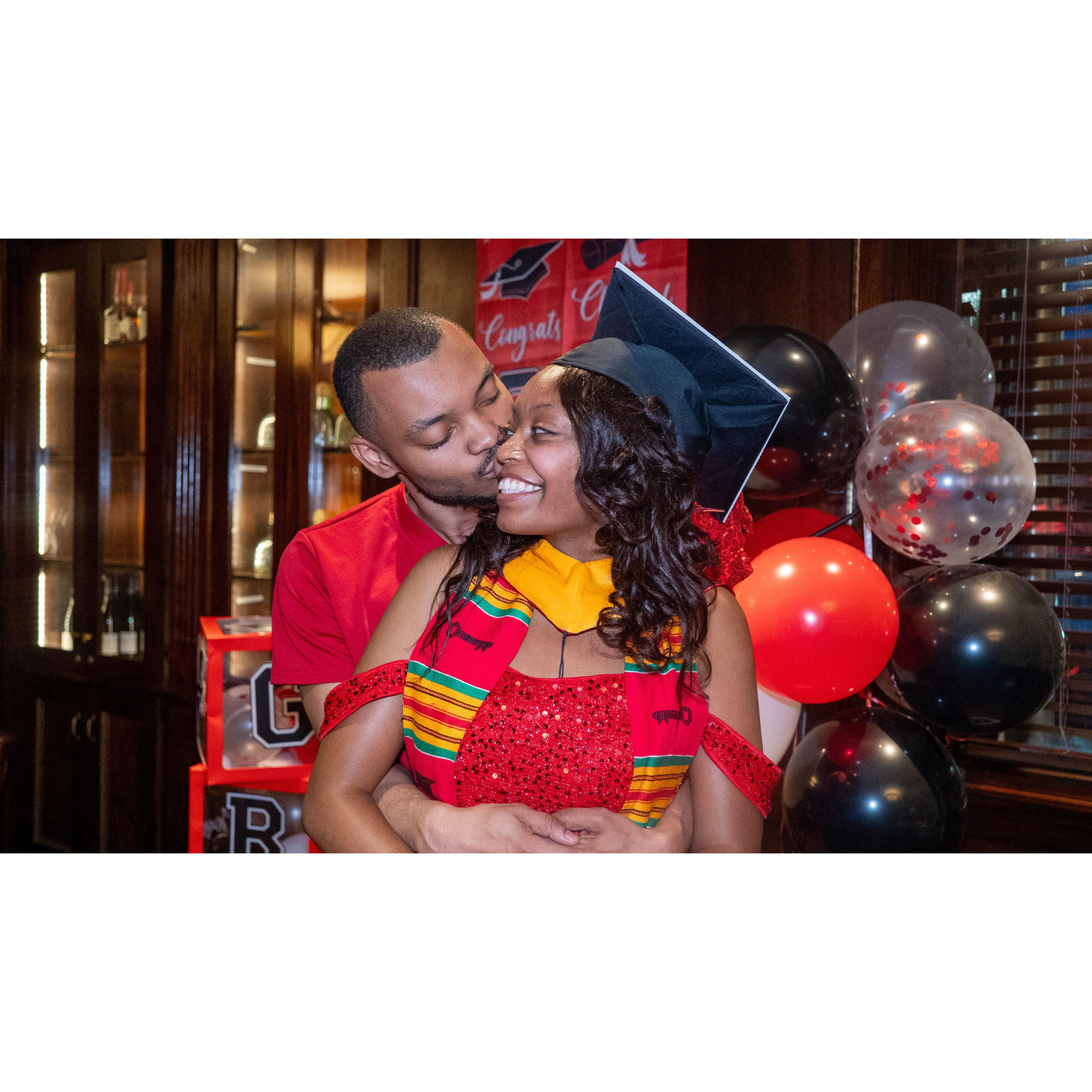 Makayla and Darren posing for engagement photos
