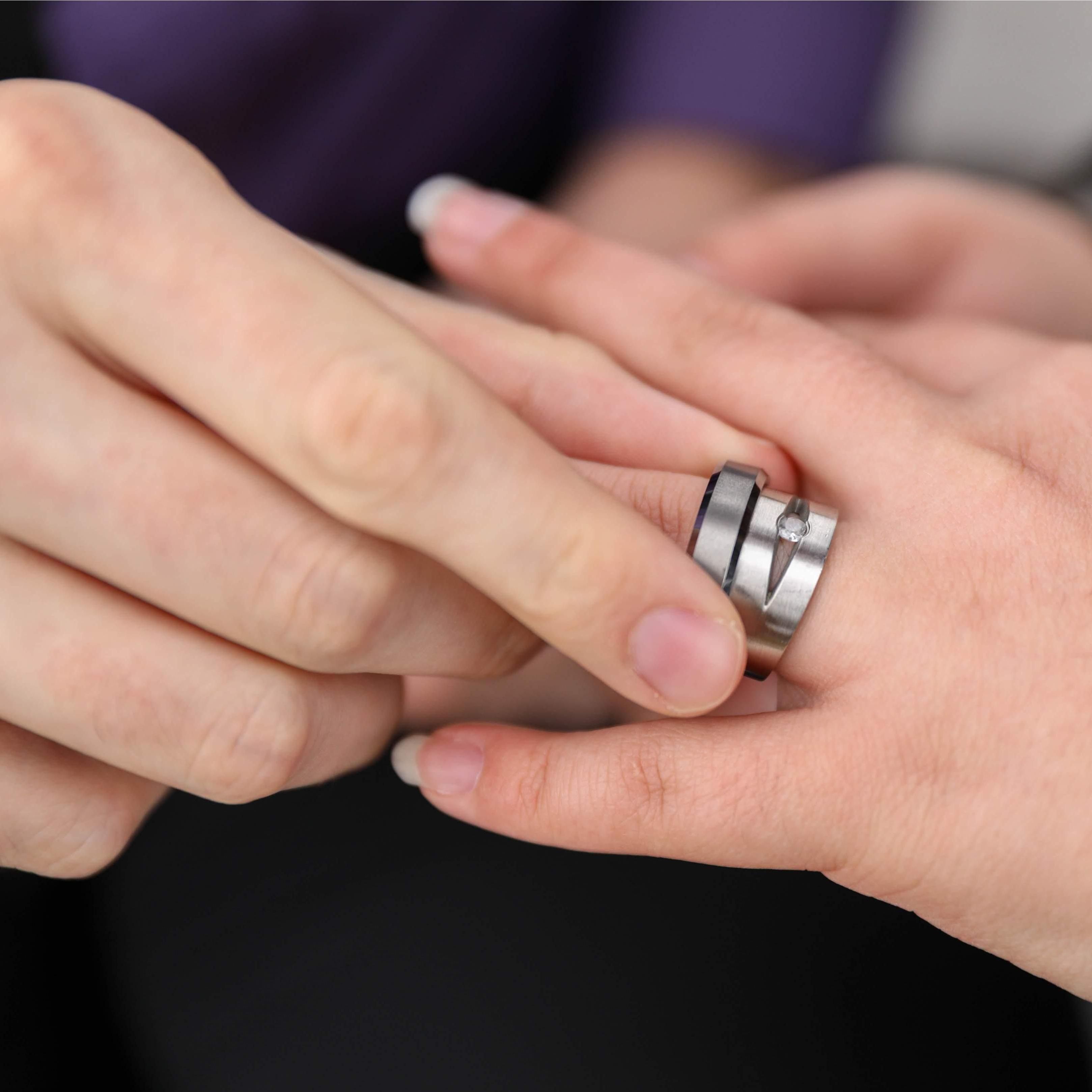 Our rings combined after I proposed to him during our photo shoot. Roll D20 Kyle!