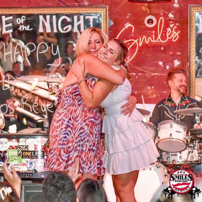 Raquel and Mom performing "Rocky's Mom"