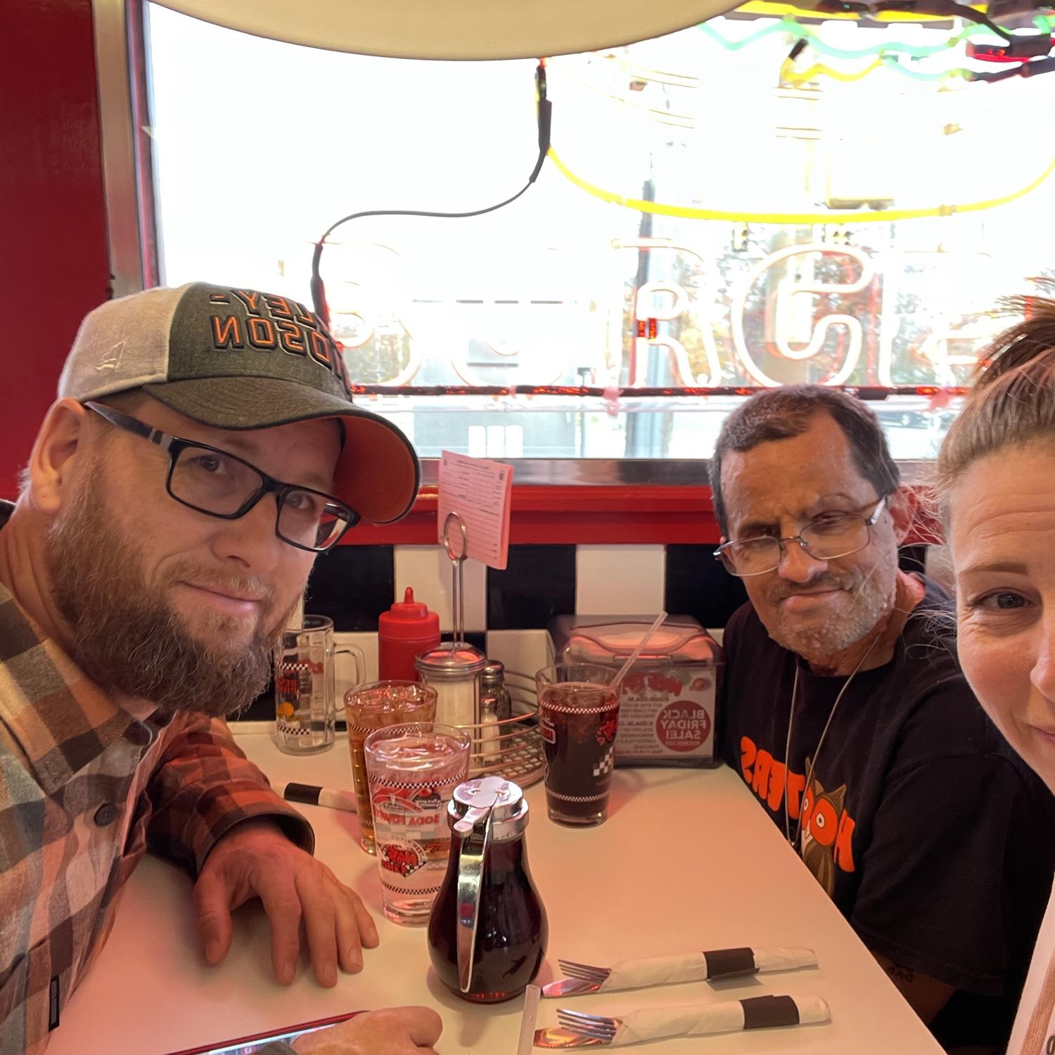 Clark, Georgie, and Susie enjoying breakfast at Nifty Fifty’s.