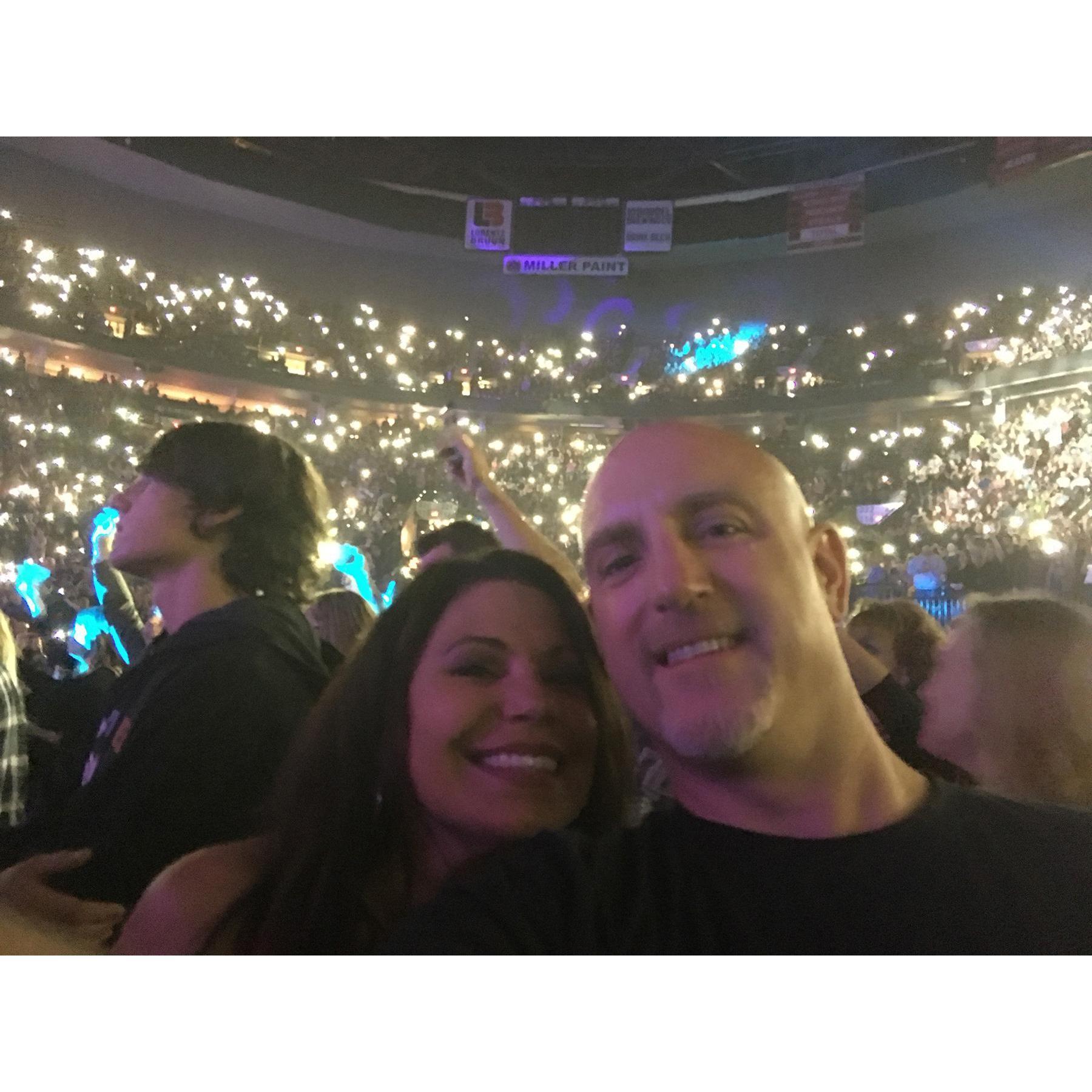 Phone lights are alive at the 2017 Def Leppard concert in the Moda Center.