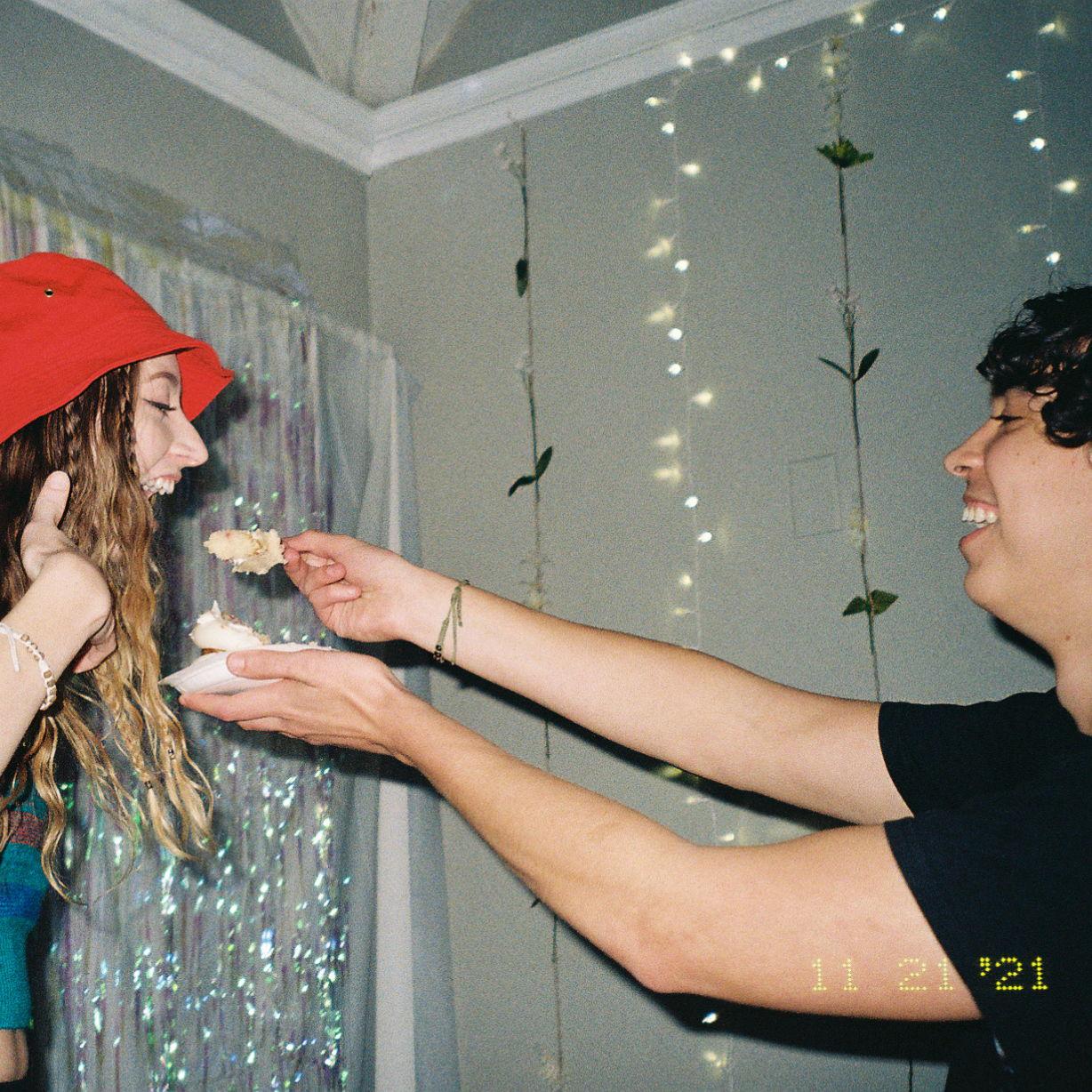 Marcus and Courtney at their friend's Spotify themed birthday party. This was a year from when they first began talking. They sang Travis Scott on karaoke this night.