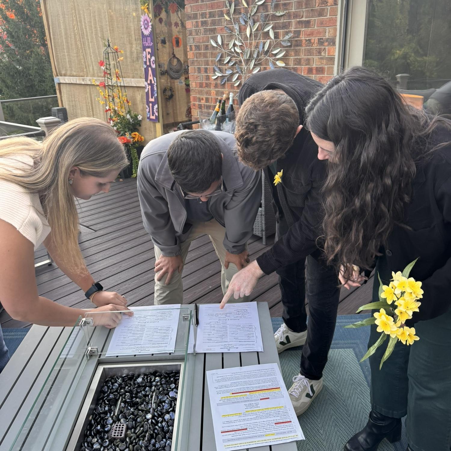 A few days later they all gathered to sign the marriage license and make it official!