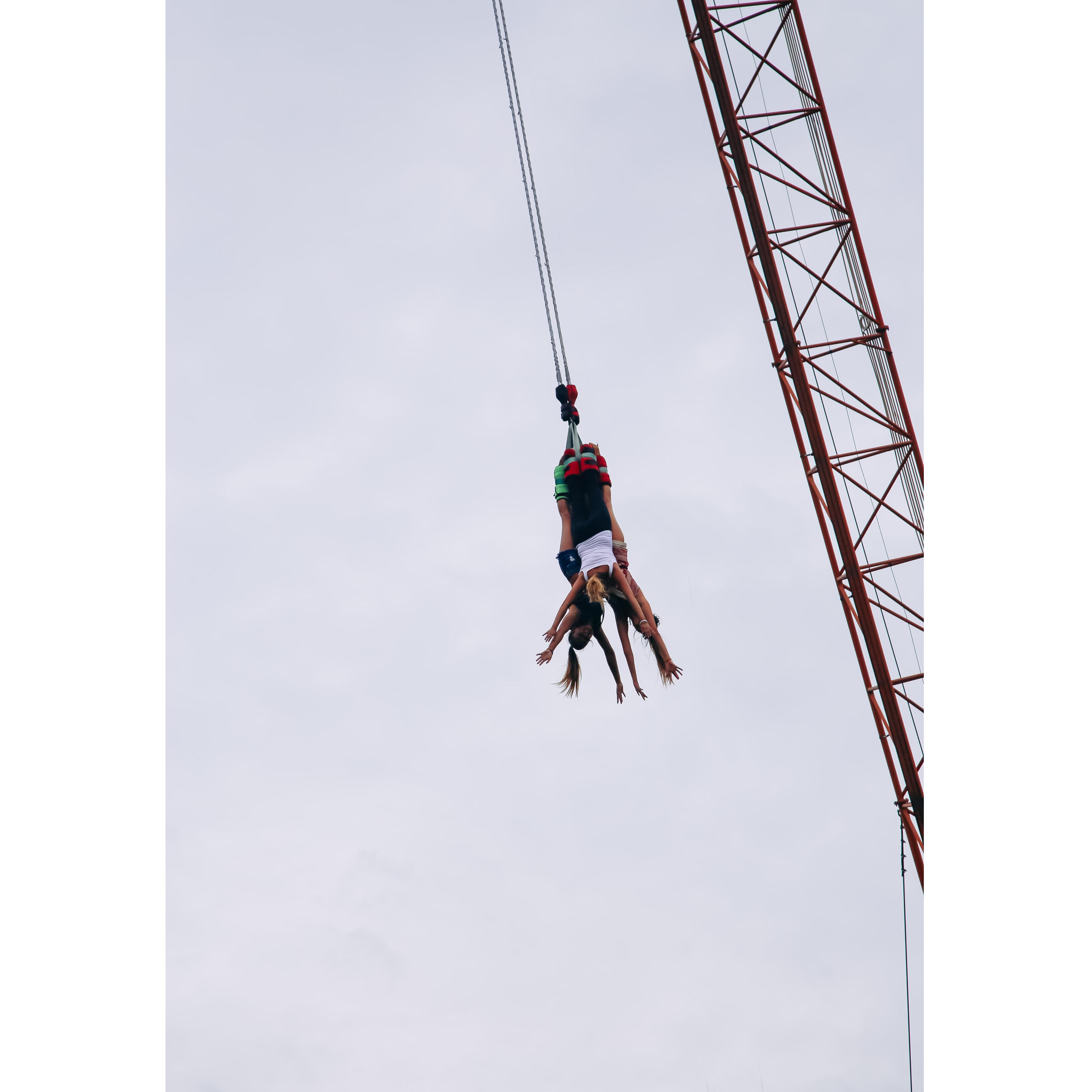 Three girls, one bungee. Amber & her two friends, Izzy & Tiff, bungee jumping together in Thailand.