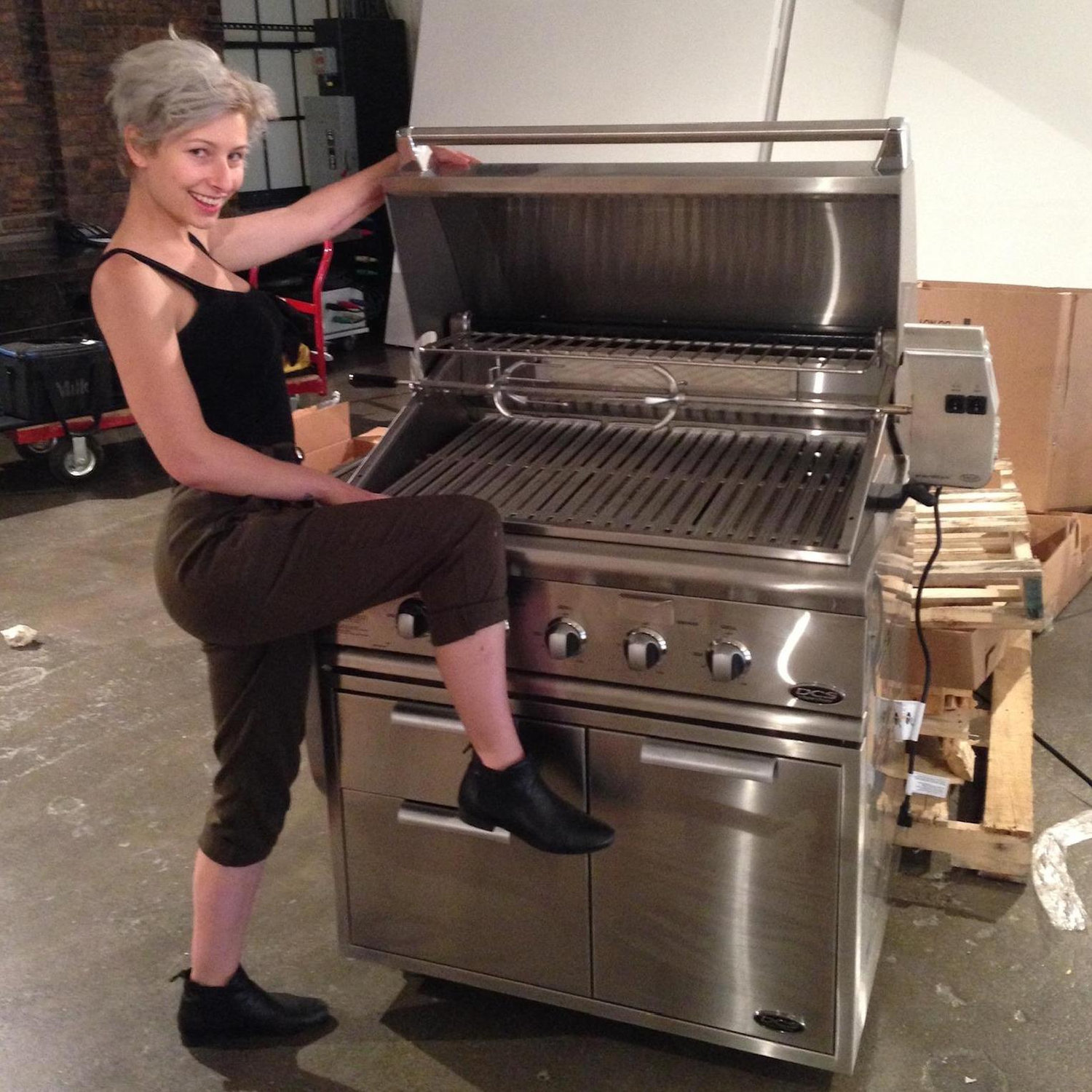 Not a photo of both of us but evidence of the first time we hung out. We were tasked with assembling this grill at work together and this was our proof that we had completed the assembly. 2014