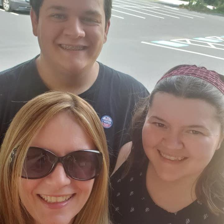 Kaitlyn with her mom and brother