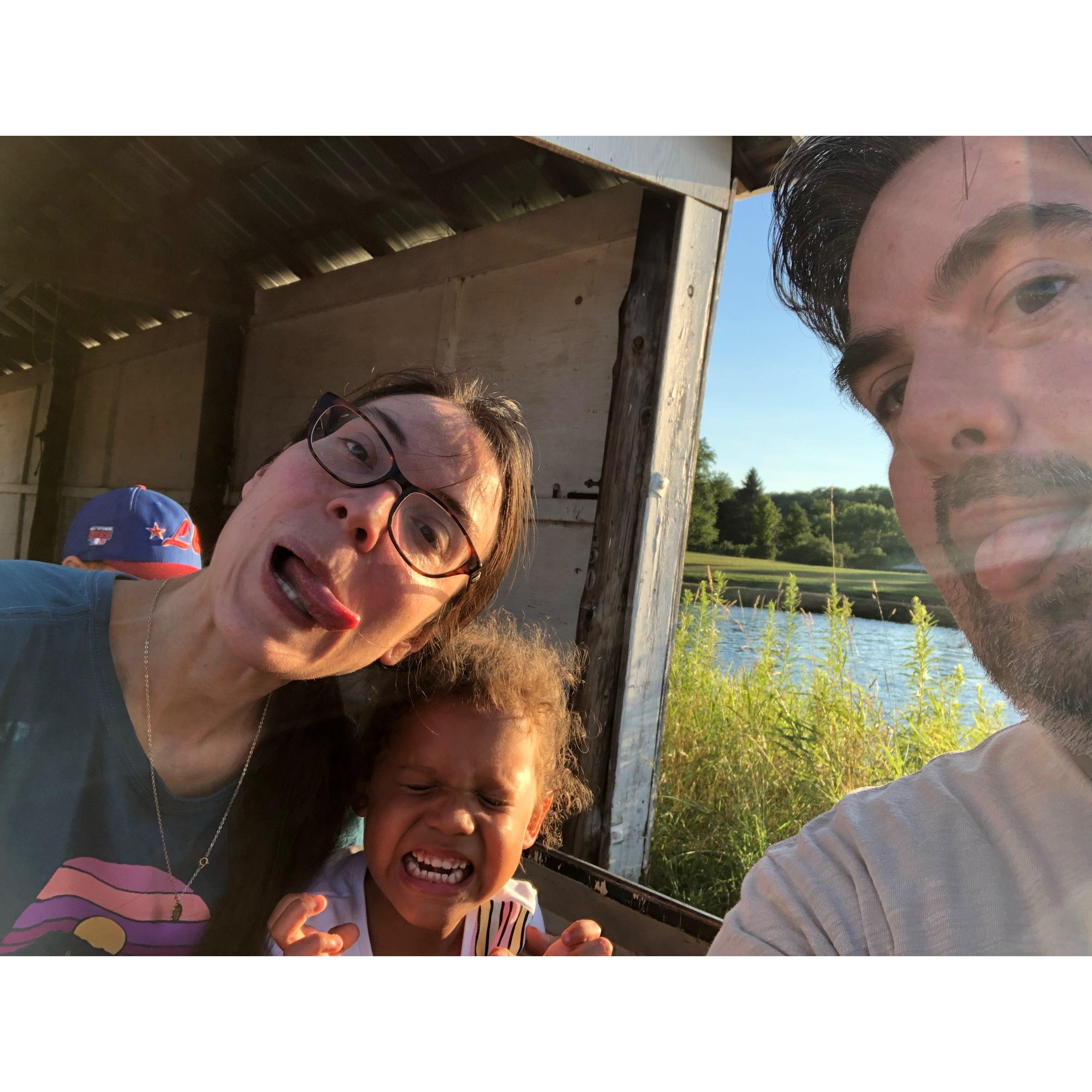 Auntie Andrea and Uncle Alex having a blast with Olivia on the big train at the Clifford Picnic (Clifford PA)