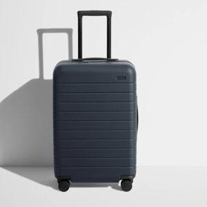Shop The Bigger Carry-On suitcase in Jet Black | Away