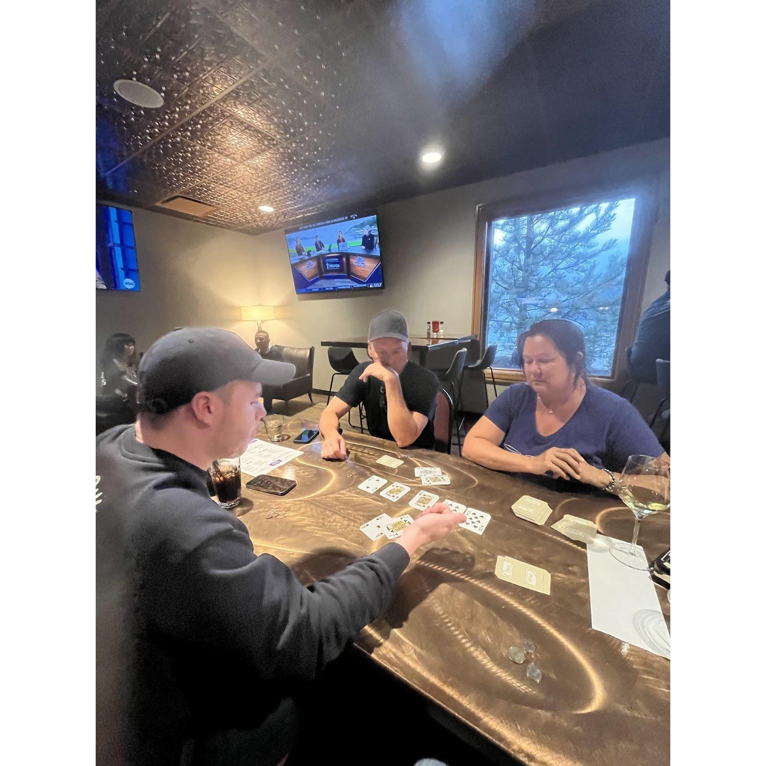 The Fords teaching Zach how to play poker—family bonding over cards and friendly competition🃏♠️♥️