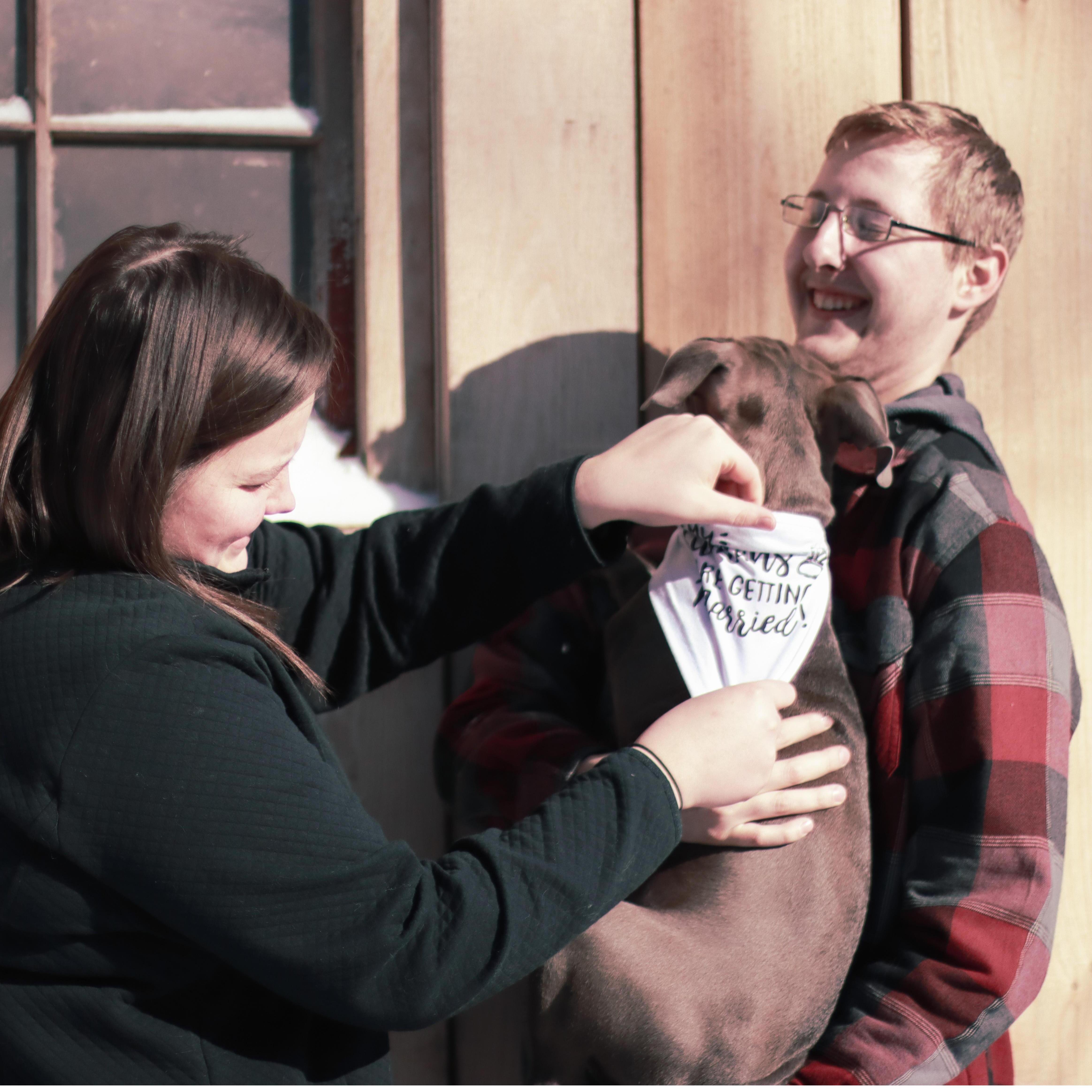 Trying to get our Merle to cooperate during engagement photos!