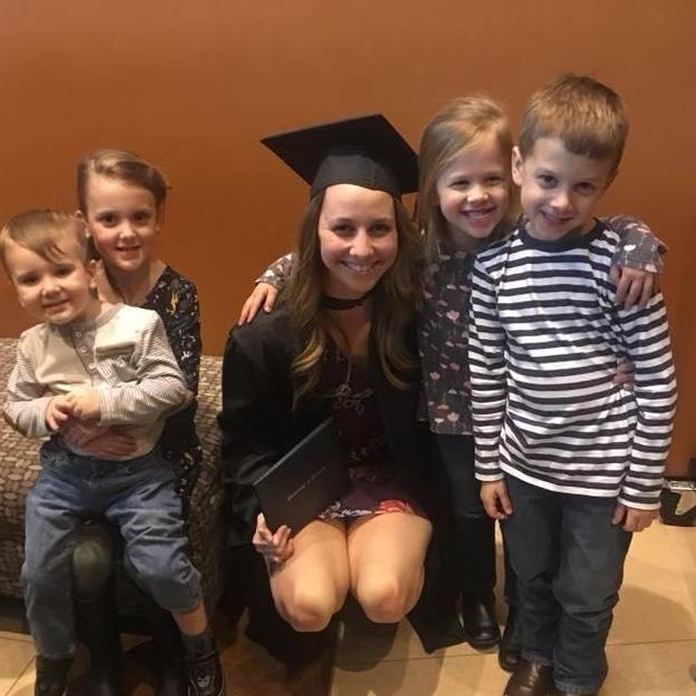 December 2018 University of Dubuque graduation with Dash, Darby, Allysha, Layla & Even