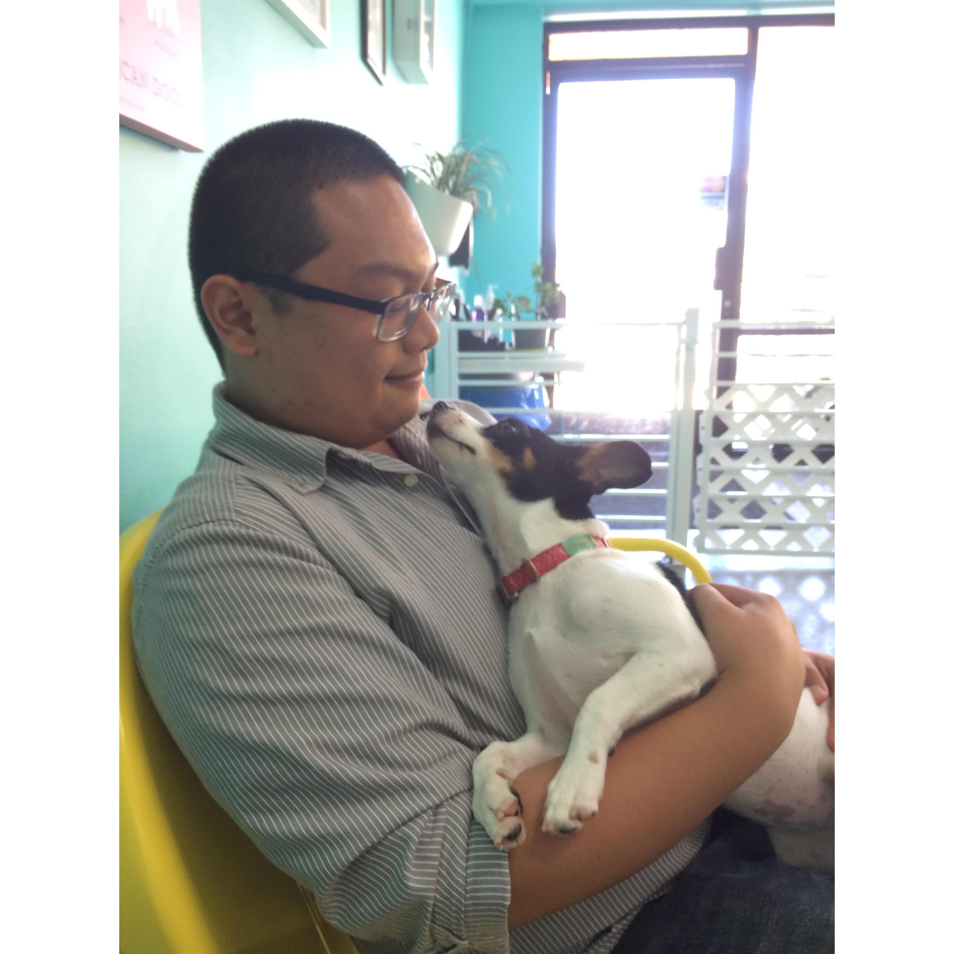 Jan and an adoptable dog bonding at the Dog Cafe LA in 2016 (sadly we did not adopt the puppy)