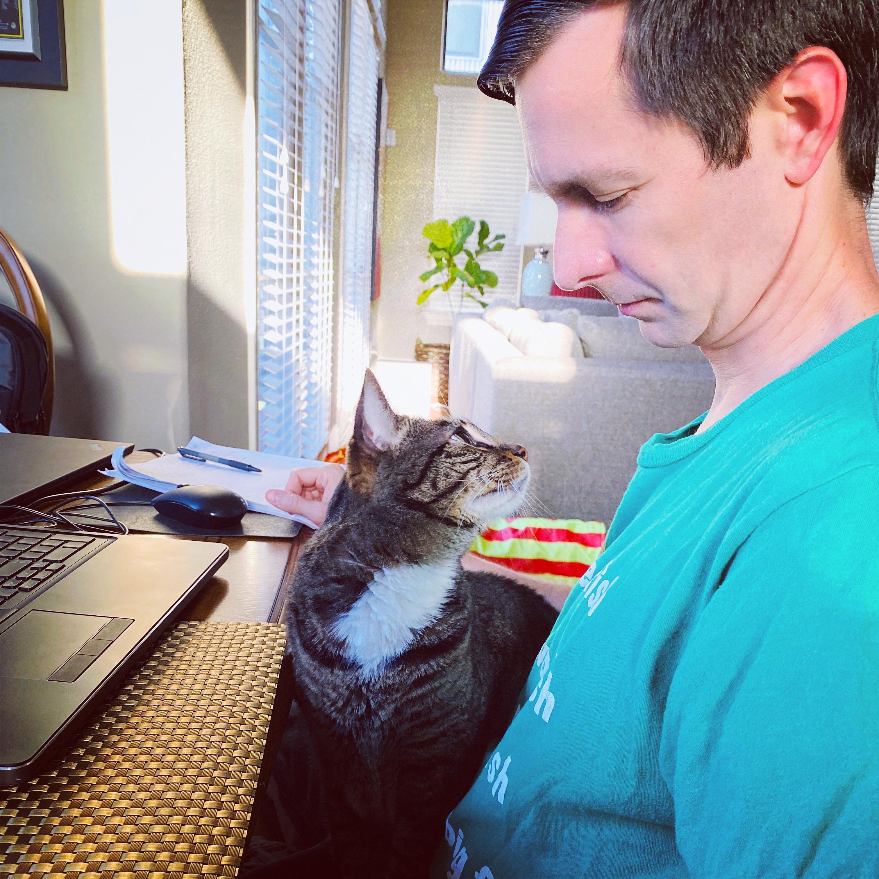 All you need is a love and a cat. 
Meow says Simon to Robert.