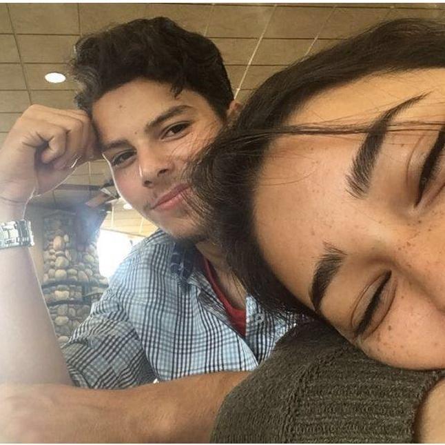 Our first picture together, two friends in a college dining hall. Pre-relationship but both definitely having a crush on each other. 2017