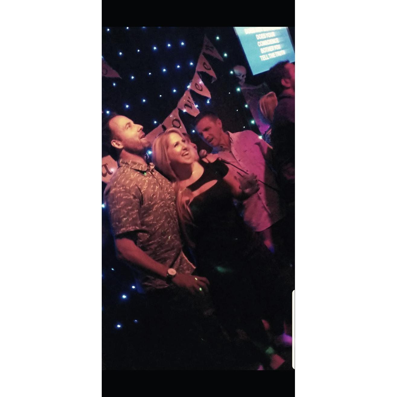 Karaokeing the night away with our new friends.