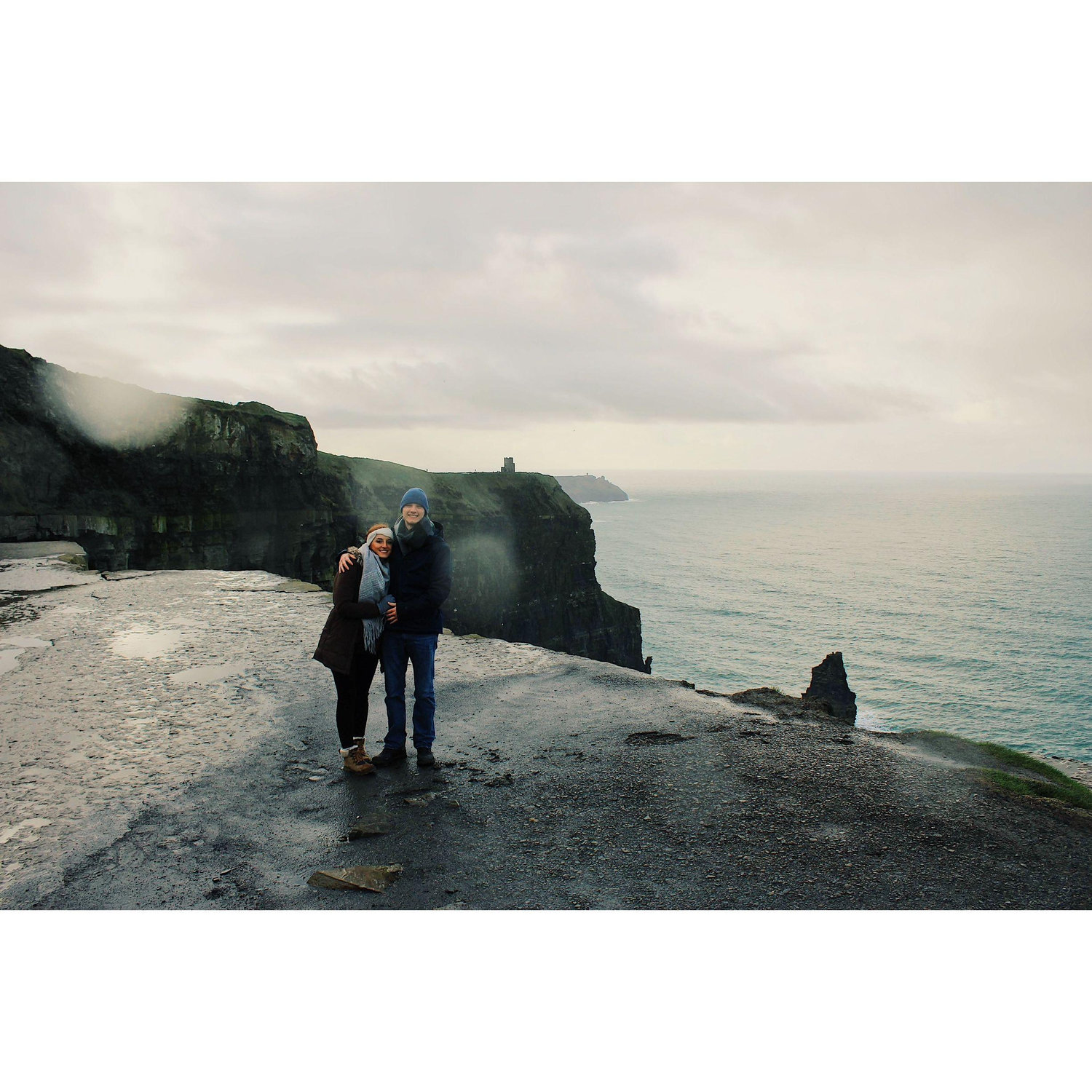 At the Cliffs of Moher in Ireland on our first trip together (2019).