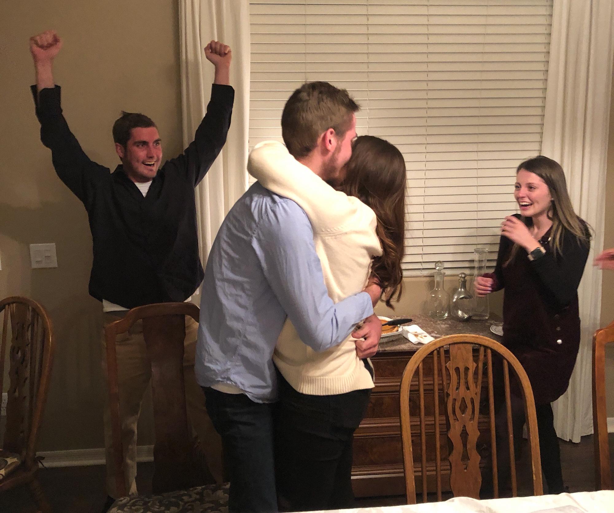 I love this picture with Devon’s siblings in the background! The night we got engaged 💍