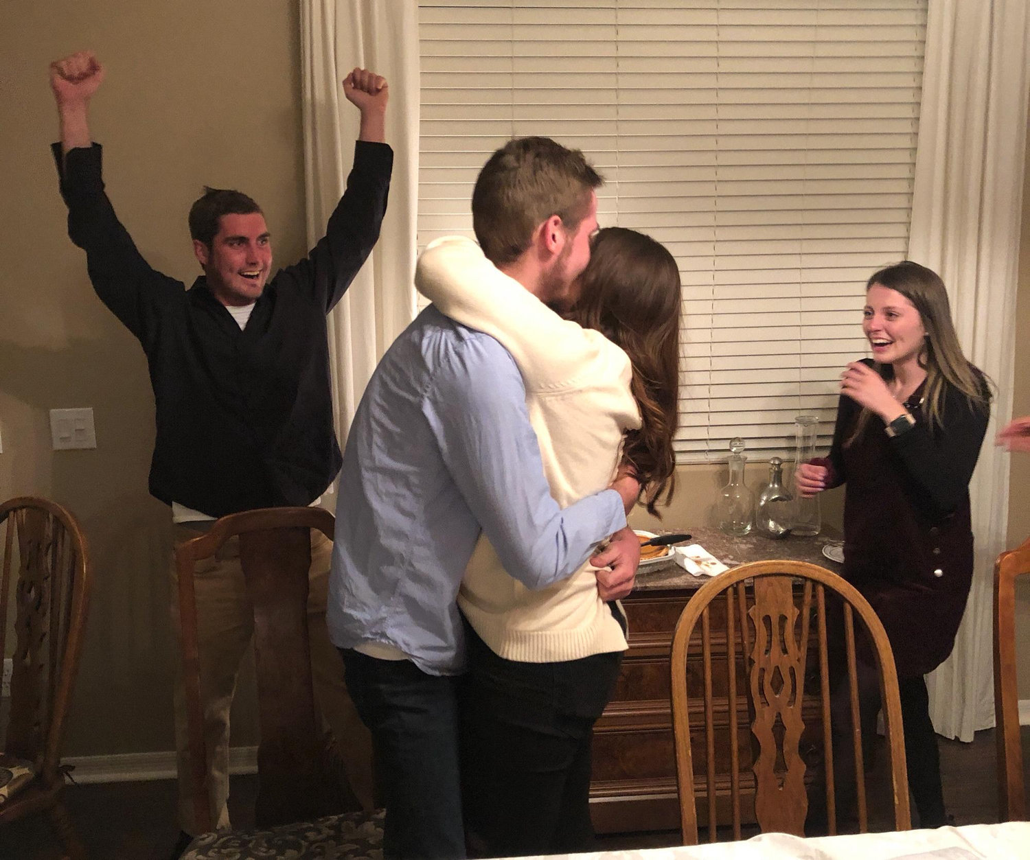 I love this picture with Devon’s siblings in the background! The night we got engaged 💍