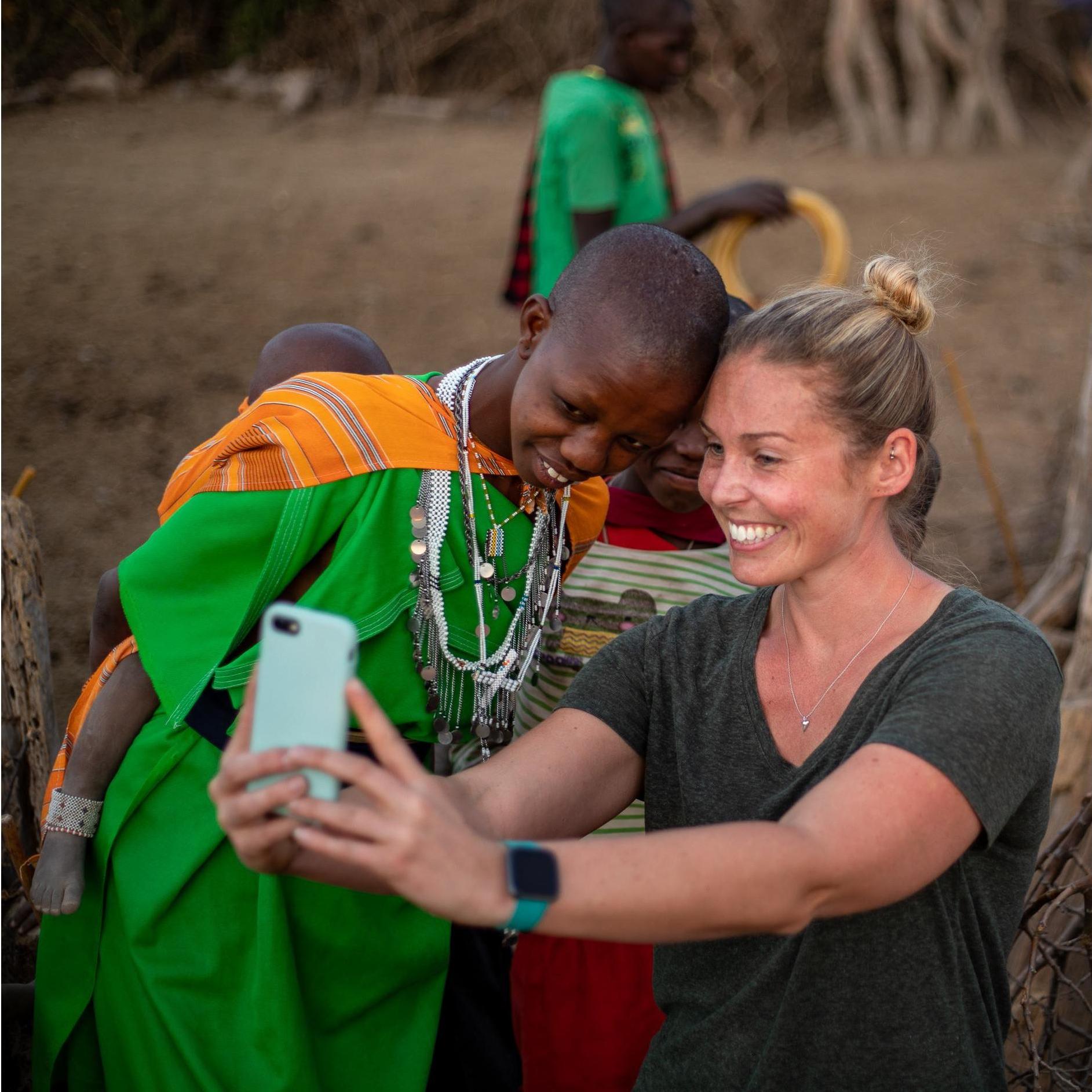 Lindsay with the younger wife of a Maasai warrior. West Kilimanjaro, Tanzania/Kenya.