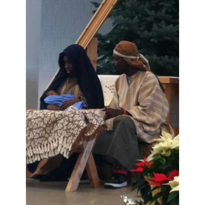This was Christmas of 2012, Imanii was baby Jesus and Marc and I were Mary and Joseph. (Marc apparently envisioned Joseph having fresh kicks lol).