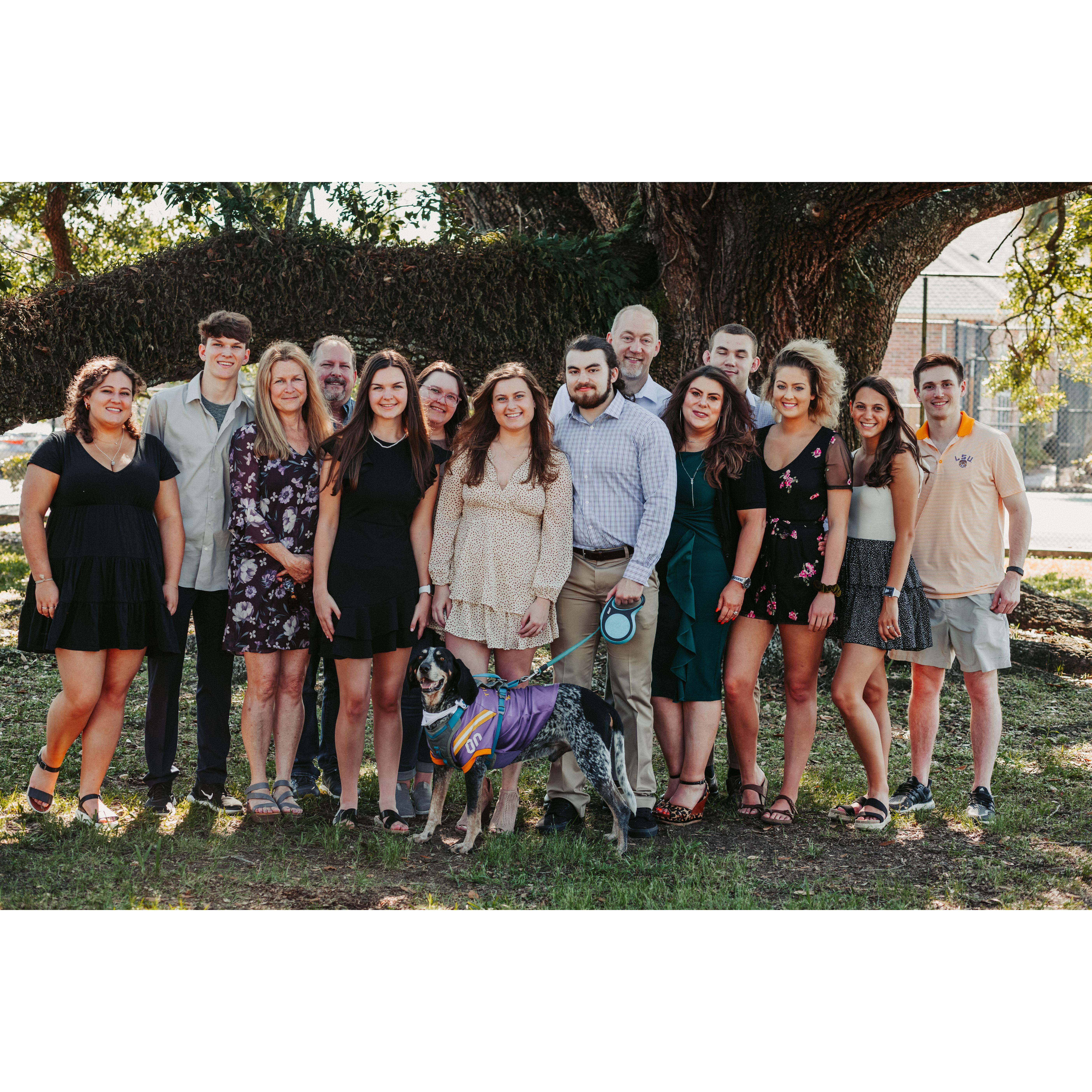 Cam and Kaitlyn with their family, friends, and Gus after the day they got engaged May 8, 2021