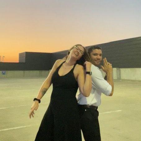 Sushi date night turned into Camryn forcing Joel to take pictures on the top floor of a parking garage downtown