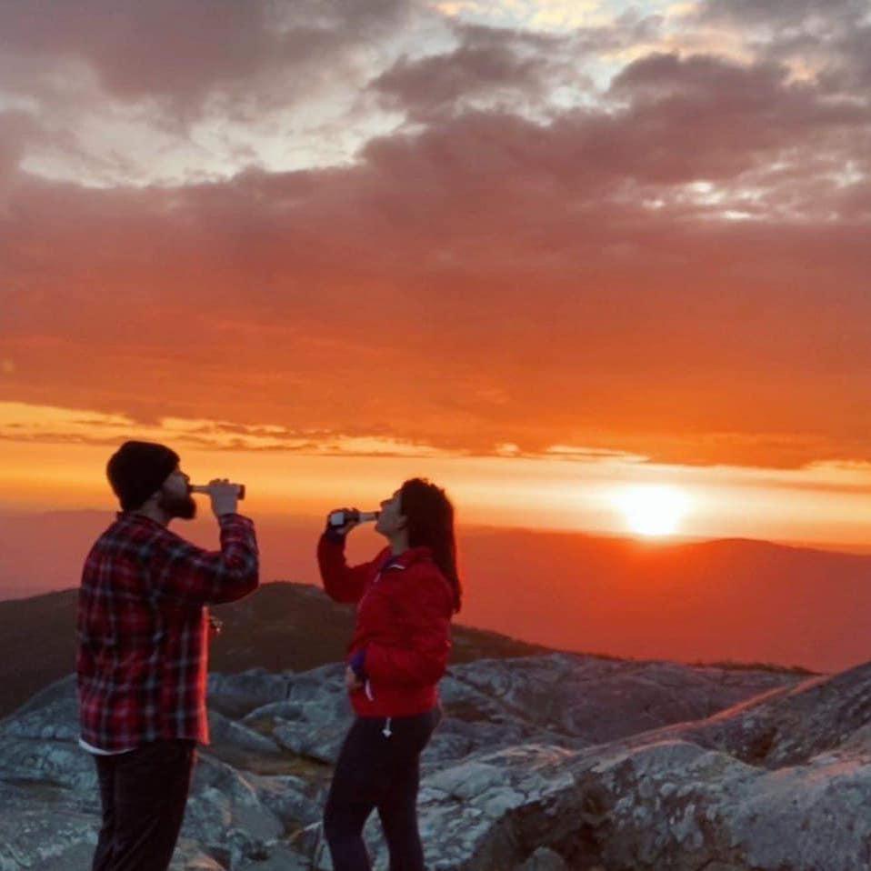 Jill's three favorite things - sunrises, champagne, & Bobby! Mount Monadnock, 4/10/21